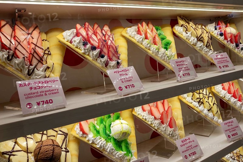 Plastic display specimens in the window of a shop for Japanese crepes in Takeshita-dori, Takeshita Street, alley with souvenir shops and restaurants in the Harajuku district at night, tourist attraction, sight, Shibuya district, Tokyo, Japan