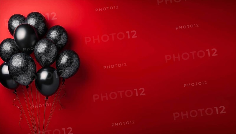 A cluster of black balloons floats against a bold red background, representing celebration, party, and sales events. The contrasting colors create a dramatic and festive atmosphere perfect for promotions, AI generated