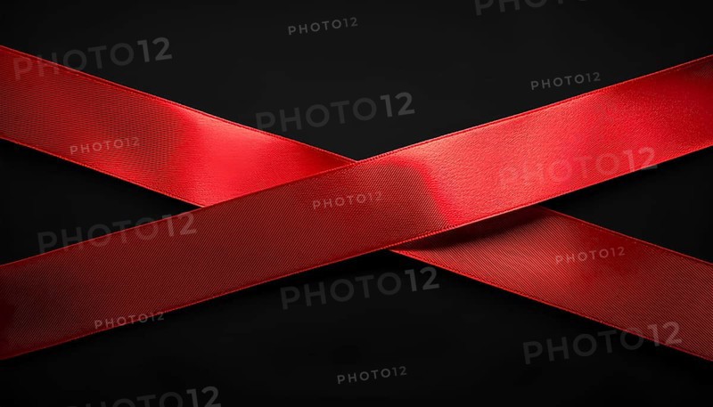 Two vibrant red satin ribbons crossed against a sleek black background, creating a minimalistic and elegant design. Perfect for holiday, gift, or special event themes, AI generated