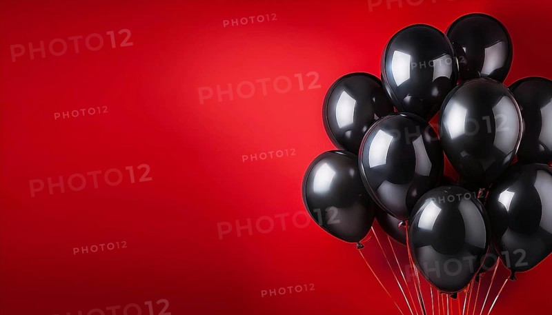A group of shiny black balloons against a vibrant red background, creating a bold and festive atmosphere. Perfect for celebrating shopping events like Black Friday and holiday promotions, AI generated