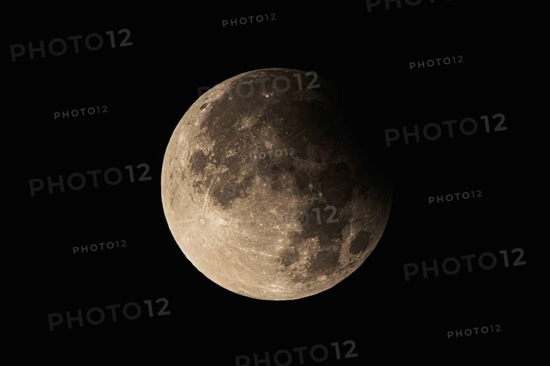 Partial lunar eclipse with detailed crater landscape. Frankfurt am Main, Hesse, Germany