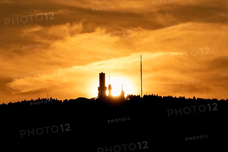 Feldberg tower in the evening glow of the setting sun. Großer Feldberg in the Taunus, Hesse, Germany