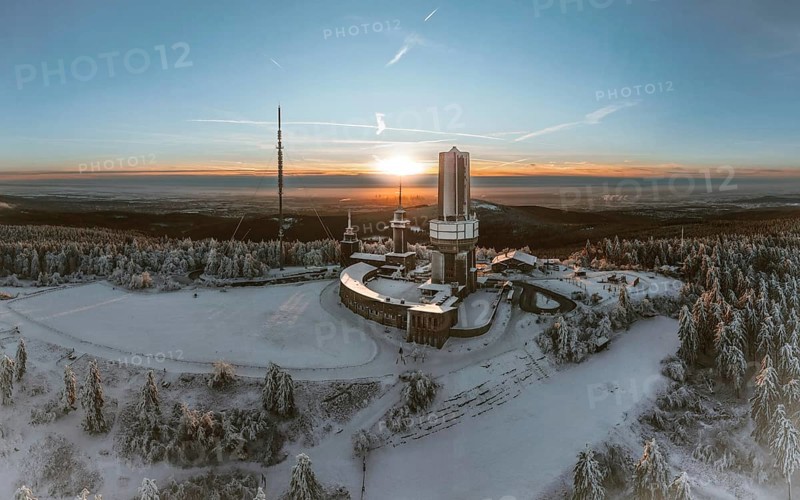 Winter landscape with atmospheric sunset. Großer Feldberg in the Taunus, Hesse, Germany