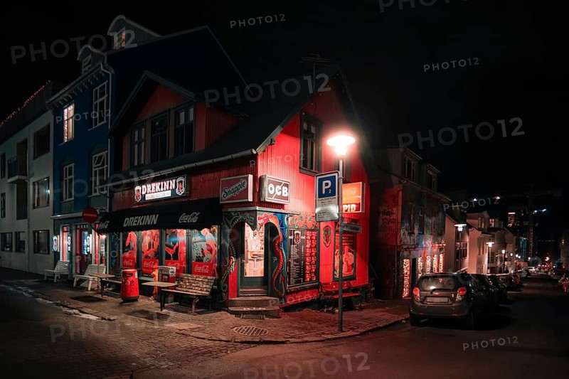 A stylish fast food restaurant in the centre of Rejkjavik at night. Rejkjavik, Iceland