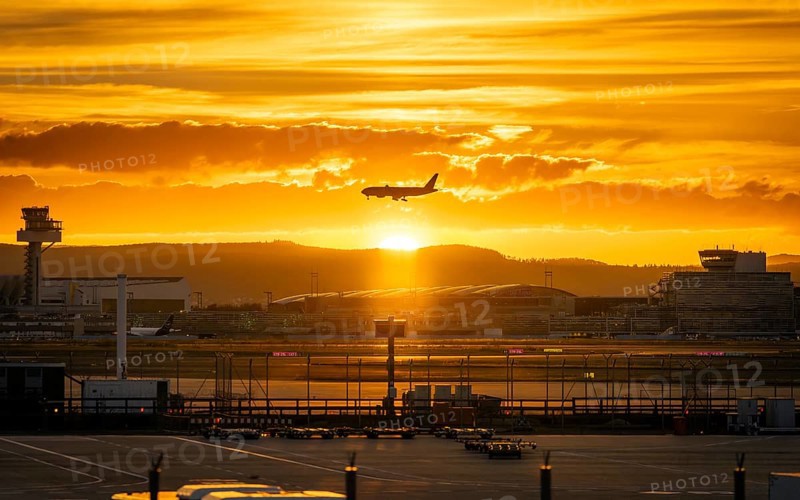 Silhouette of a jet at sunset. Frankfurt Airport, Hesse, Germany