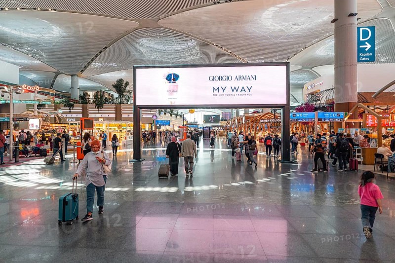 Airport terminal with travellers and shops. Istanbul Airport, Arnavutköy, Istanbul, Turkey