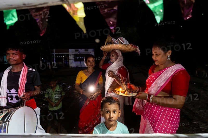 Members of the tea tribe community celebrate the vibrant Karam Festival with traditional rituals at a tea estate in Bokakhat, Assam, India, on 3 September 2025. Karam Puja, one of the most popular harvest festivals, is a celebration dedicated to the Karam tree. This tree symbolizes fertility, prosperity, and all things auspicious. During the festival, Karma dancers carry a branch of the Karam tree while singing and dancing