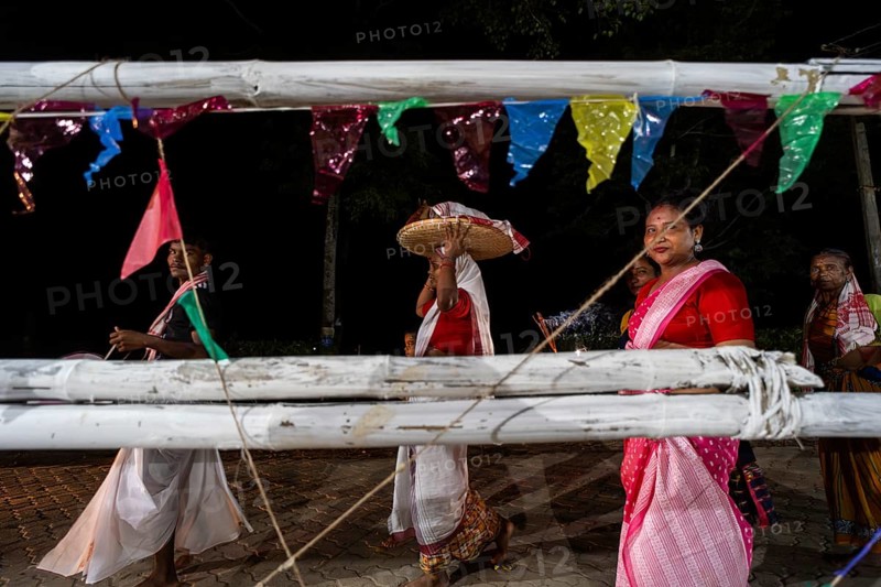 Members of the tea tribe community celebrate the vibrant Karam Festival with traditional rituals at a tea estate in Bokakhat, Assam, India, on 3 September 2025. Karam Puja, one of the most popular harvest festivals, is a celebration dedicated to the Karam tree. This tree symbolizes fertility, prosperity, and all things auspicious. During the festival, Karma dancers carry a branch of the Karam tree while singing and dancing
