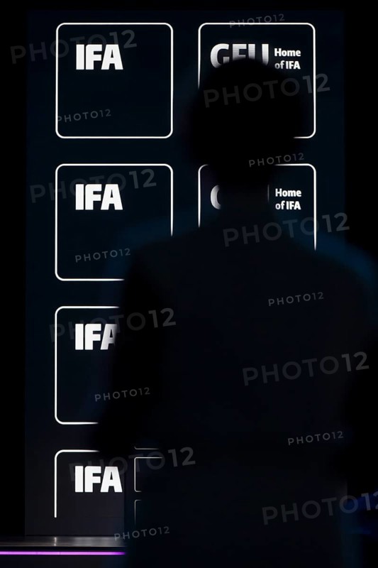 Logos of IFA and GFU behind the silhouette of a person at the opening gala of the IFA Funkausstellung in the CityCube, Berlin, 04/09/2025