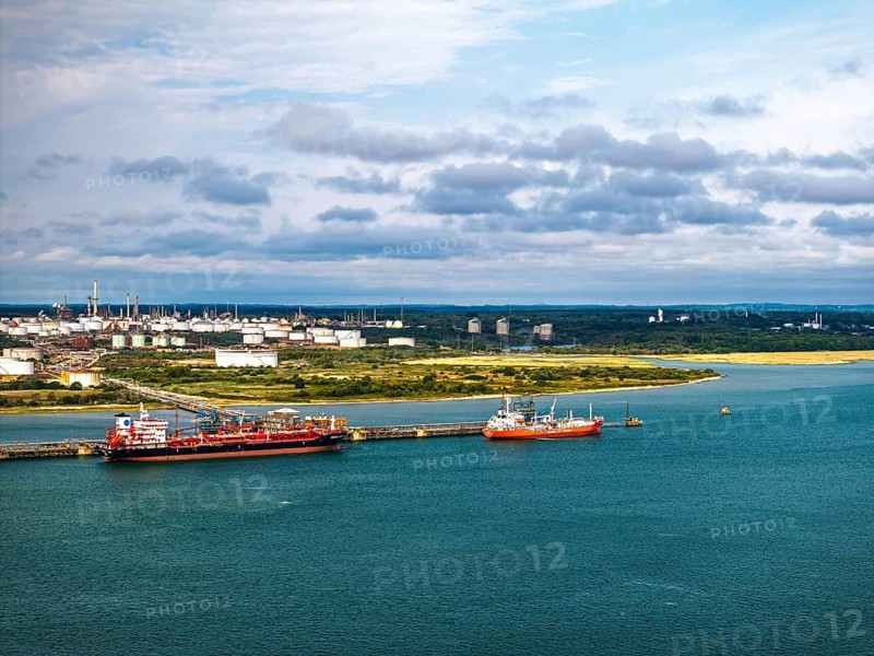 Gas tankers over refinery Esso Oil Terminal from drone, Southampton, Hampshire, England, United Kingdom