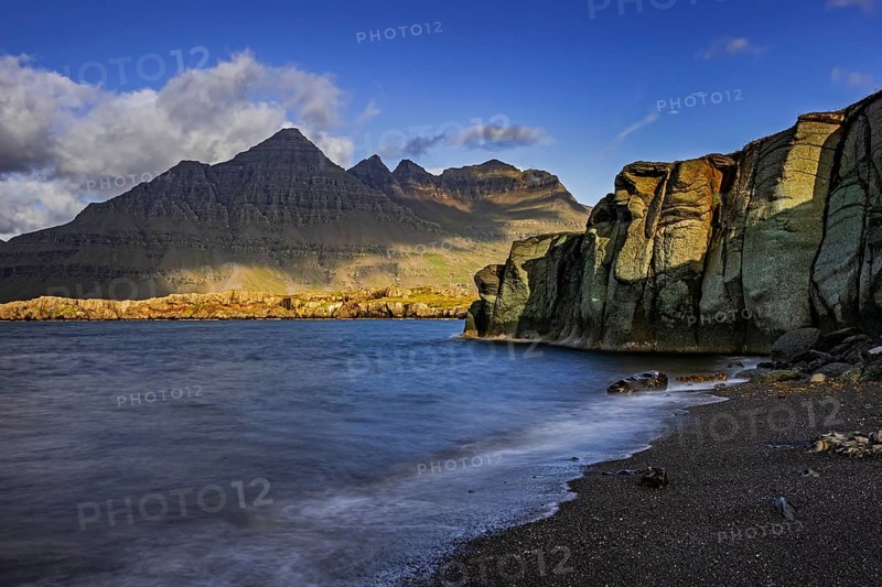Sea, surf, beach, shore, cliff, mountains, clouds, morning light, long exposure, summer, Berufjördur, Blabjörg cliffs, Teigarhorn behind, East Fjords, Iceland