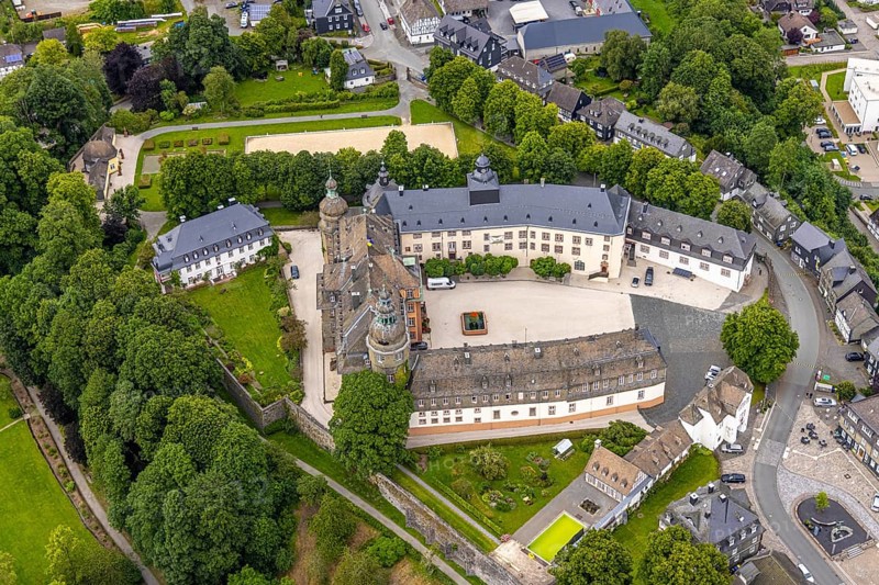 Aerial view, Schloss Berleburg, residential palace of the Sayn-Wittgenstein family, orangery and cross garden, water tank, Bad Berleburg, Wittgensteiner Land, North Rhine-Westphalia, Germany, nobility, architecture, elegance, Sayn-Wittgenstein family, building, green space, gardens, cross garden, landscape, landscape design, orangery, panorama, park, residential palace, palace complex, sight, summer, symmetry, daylight, tourism, bird's eye view, heritage-protected building, historic building, cultural heritage