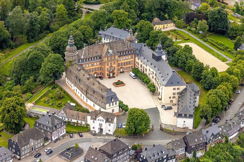 Aerial view, Schloss Berleburg, residence of the Sayn-Wittgenstein family, orangery and cross garden, Bad Berleburg, Wittgensteiner Land, North Rhine-Westphalia, Germany, nobility, architecture, exterior view, trees, monument, heritage, Europe, Sayn-Wittgenstein family, building, history, green spaces, gardens, cross garden, culture, country estate, landscape, orangery, panoramic view, parks, wealth, residence, castle, sight, summer, daylight, tourism, landmark, historic, rich in tradition