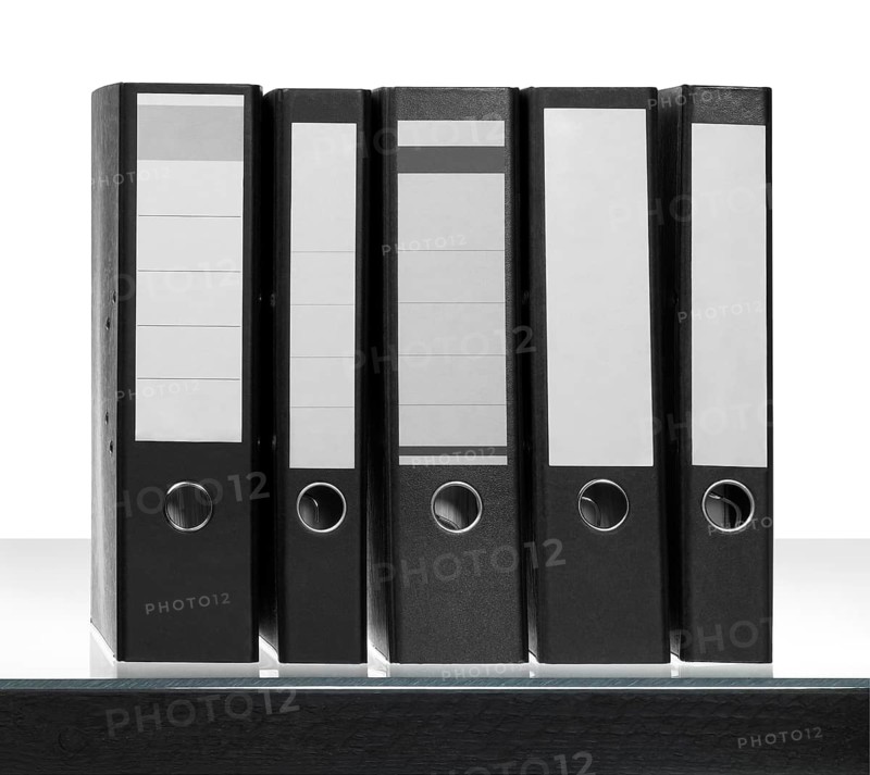 Some Folders on desk surface in white back
