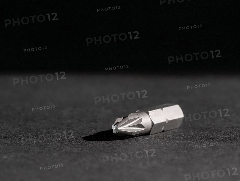 Closeup shot of a screwdriver bit in dark ambiance