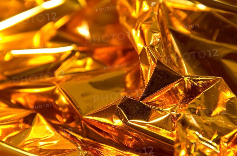 Full frame creased gold foil background