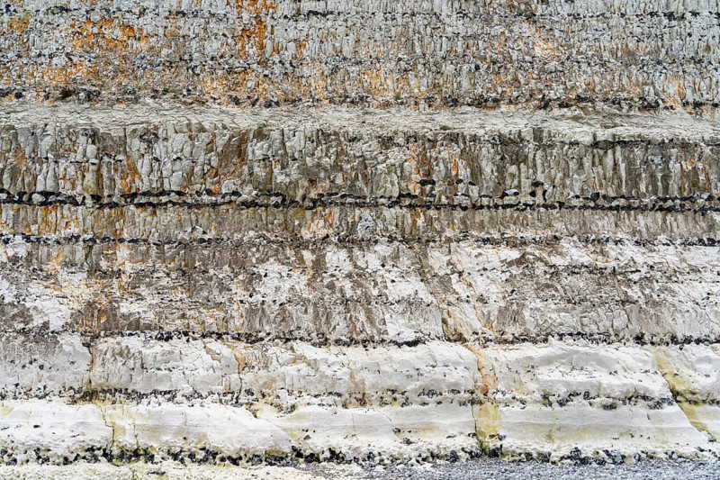 Chalk cliff closeup seen near Fecamp, a commune in the department of Seine-Maritime at the Normandy region in northwestern France