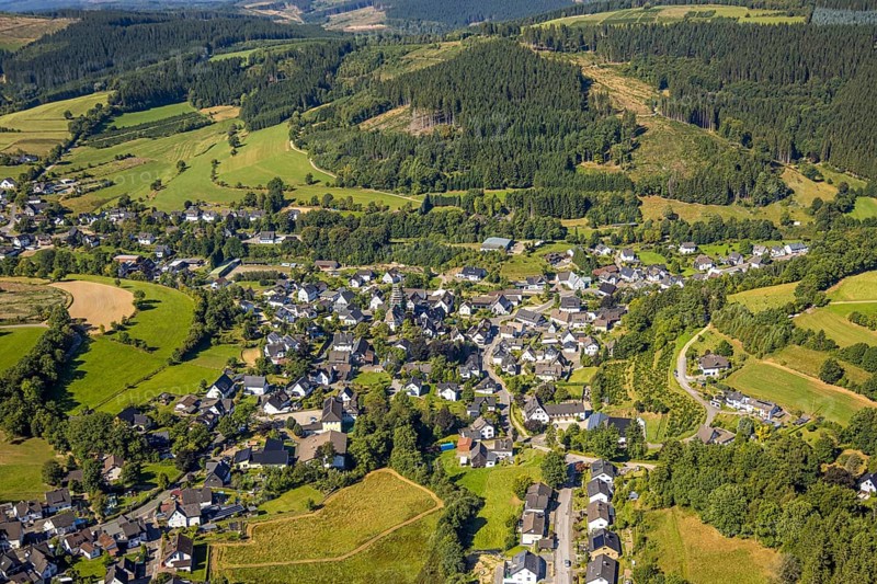 Aerial view, Heinsberg town centre and building site and renovation work on the church tower of the Catholic parish church of St. Katharina, Heinsberg, Kirchhundem, Sauerland, North Rhine-Westphalia, Germany, place of worship, construction work, construction area, construction site, scaffolding, building plots, construction project, construction site, DE, Europe, religious community, place of worship, holy place, church, parish, denomination, aerial view, aerial photography, aerial photography, religion, religious site, overview, bird's eye view, birds-eyes view, overview