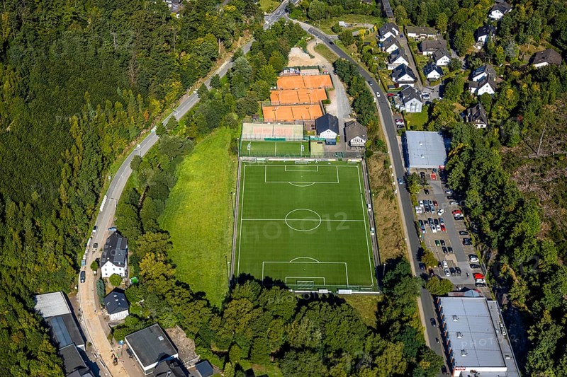 Aerial view, football stadium sports field FC Kirchhundem 1946 and tennis court TC Rot-Weiß Kirchhundem, Kirchhundem, Sauerland, North Rhine-Westphalia, Germany, DE, Europe, football field, football stadium, football club, aerial view, aerial photography, aerial photography, Rewe Kaufpark, sports, sports facilities, sports field, sports facility, tennis, tennis facility, tennis courts, tennis club, overview, bird's-eye view, overview