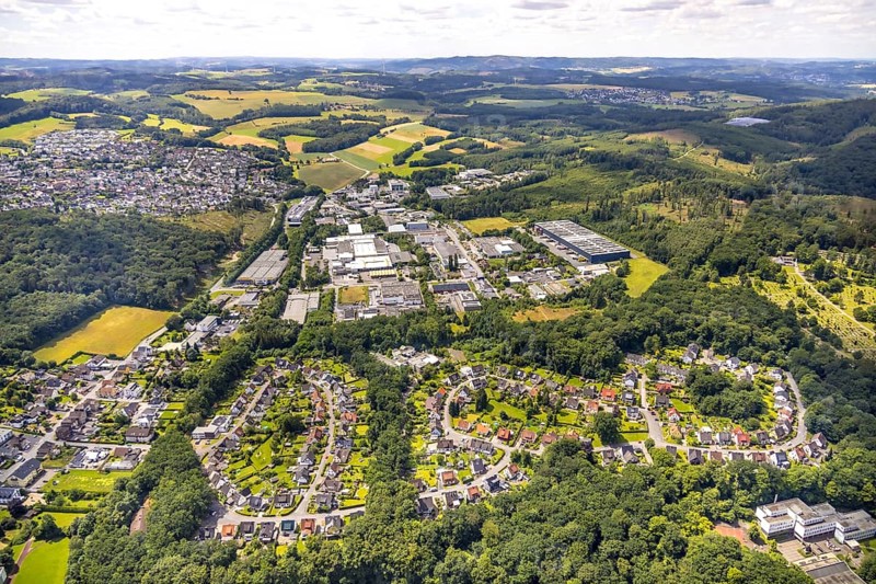 Aerial view, circular housing estate Rumbecker Holz, commercial area Wiebelsheide, behind residential area local view Herdringen, forest and meadows, distant view and blue sky with clouds, Herdringen, Arnsberg, Sauerland, North Rhine-Westphalia, Germany, circular, housing estate, Rumbecker Holz, commercial area, Wiebelsheide, residential area, local view, forest, meadows, distant view, blue sky, clouds, architecture, landscape, nature, urban, village, houses, top view, buildings, infrastructure, panoramic view, settlement, rural, sky, weather, view, regional, European, zone