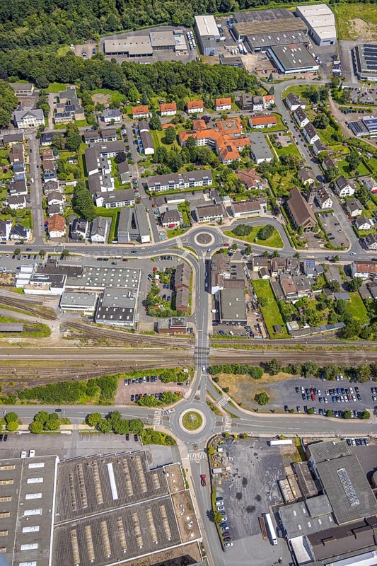 Aerial view, two roundabouts Von-Lilien-Straße, between Bahnhofstraße and Kleinbahnstraße, residential area, Hüsten, Arnsberg, Sauerland, North Rhine-Westphalia, Germany, roundabouts, Von-Lilien-Straße, Bahnhofstraße, Kleinbahnstraße, railway tracks, houses, infrastructure, urban planning, traffic, roads, intersection, railway, architecture, settlement, city, landscape, urban, transport, aerial view, urban, building
