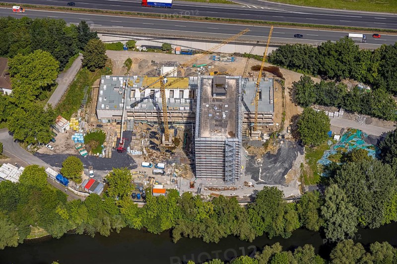 Aerial view, construction site with new Arnsberg town hall on the A46 motorway, Neheim, Arnsberg, Sauerland, North Rhine-Westphalia, Germany, construction site, new building, Arnsberg town hall, A46 motorway, architecture, building, infrastructure, traffic, development, construction, urban, city, region, landscape, drone image, modern, urban planning, road network, construction crane, progress, construction phase, industry, construction work, structural, location, public, administration