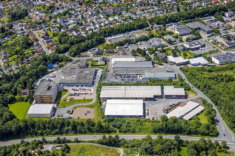 Aerial view, commercial area Von-Siemens-Straße, local view Bergheim, Bergheim, Arnsberg, Sauerland, North Rhine-Westphalia, Germany, commercial area, Von-Siemens-Straße, local view, industry, buildings, streets, infrastructure, townscape, aerial view, companies, enterprises, factories, traffic routes, roofs, cars, development, economy, town planning, architecture, trade, business, environment, region, overview, city, modern