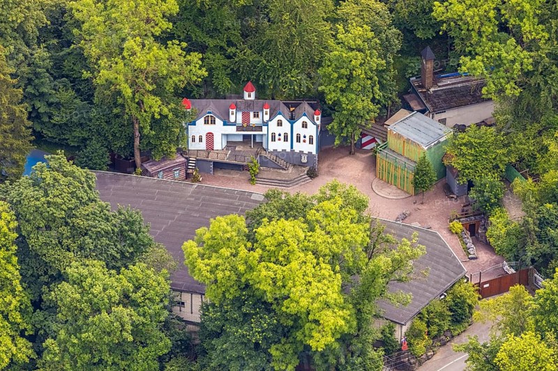 Aerial view, open-air stage covered by trees and neighbouring buildings with towers, Herdringen, Arnsberg, Sauerland, North Rhine-Westphalia, Germany, DE, Europe, aerial view, aerial photography, aerial photography, Ruhr area, overview, bird's-eye view, overview