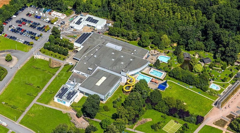 Aerial view, Solepark Große Wiese leisure pool wet with water slide, sunbathing lawn and swimming pool, graduation house salt works, car parks, Hüsten, Arnsberg, Sauerland, North Rhine-Westphalia, Germany, Solepark, Große Wiese, leisure pool, water slide, sunbathing lawn, swimming pool, graduation house, salt works, park, summer, leisure, recreation, bathing fun, families, children, adults, fun, water, nature, attractions, infrastructure, public, tourism, landscape, bird's eye view, swimming, slides, sunshine, outdoor, leisure centre