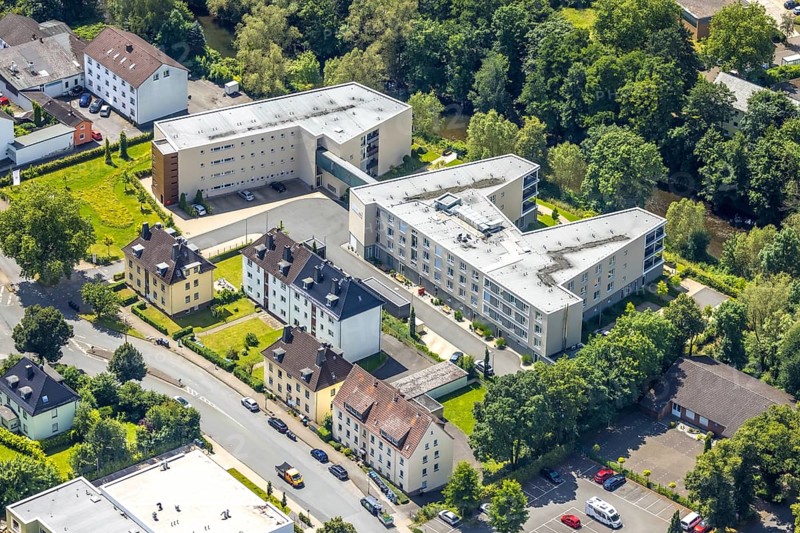 Aerial view, new construction of the Ruhrblick retirement home in Clemens-August-Straße, Obereimer, Arnsberg, Sauerland, North Rhine-Westphalia, Germany, new construction, retirement home, Ruhrblick, Clemens-August-Straße, building, roof, flats, nursing home, architecture, modern, infrastructure, city, environment, green spaces, river, landscape, construction project, development, urban, residential building, urban planning, perspective, drone shot, real estate, urban district