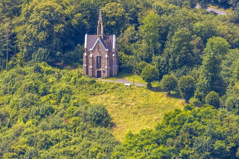 Aerial view, Kreuzberg chapel on the Kreuzberg in the forest area, Arnsberg, Sauerland, North Rhine-Westphalia, Germany, Kreuzberg chapel, Kreuzberg, forest area, church, chapel, catholic, religion, architecture, landscape, nature, forest, tree, hill, green, sight, tourism, view, panorama, building, history, region, travel photography, sky, outdoor shot, summer, day, rural, landmark