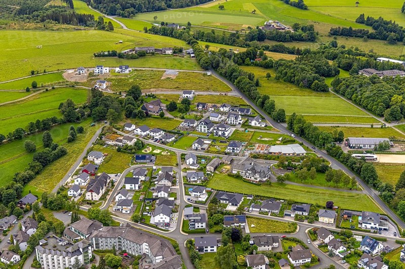 Aerial view, new residential area Am Sengelsberg, below the house at Sähling - evangelisches Johanneswerk nursing home, Bad Berleburg, Wittgensteiner Land, North Rhine-Westphalia, Germany, Am Sengelsberg, architecture, exterior view, trees, roofs, development, building, community, green spaces, house, real estate, infrastructure, Johanneswerk, landscape, new construction, care facility, nursing home, settlement, summer, city, urban planning, streets, Sähling, daylight, urban, residential area, residential houses, evangelical, rural, modern, above