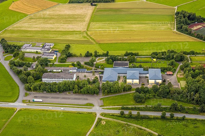 Aerial view, Ludwig-zu-Sayn-Wittgenstein-Schule Hauptschule und Städt. secondary school, meadows and fields, Bad Berleburg, Wittgensteiner Land, North Rhine-Westphalia, Germany, architecture, exterior, educational institution, trees, village, fields, spring, building, green, secondary school, sky, landscape, agriculture, Ludwig-zu-Sayn-Wittgenstein-Schule, nature, secondary school, region, school, school grounds, summer, daylight, surroundings, meadows, German school system, European, peaceful, rural, vegetation, overview