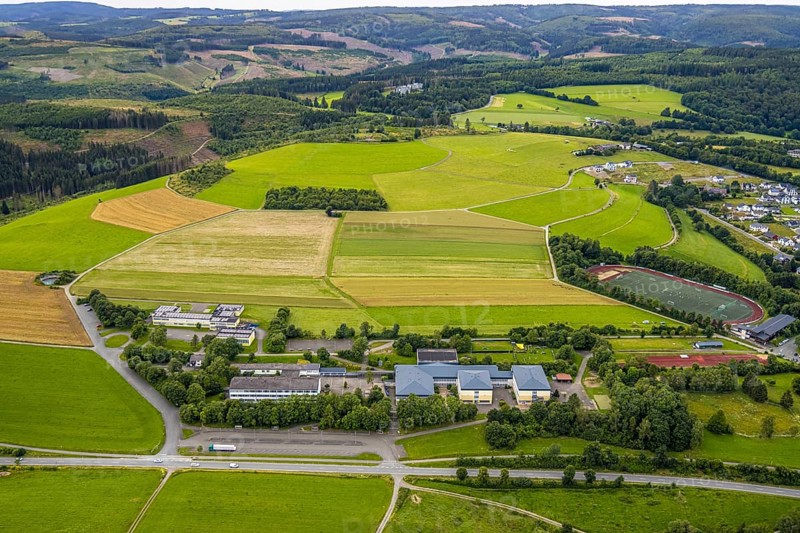 Aerial view, Ludwig-zu-Sayn-Wittgenstein-Schule Hauptschule and Städt. secondary school, meadows and fields, wooded area with forest damage and hilly landscape, Bad Berleburg, Wittgensteiner Land, North Rhine-Westphalia, Germany, view, education, trees, fields, geography, green area, secondary school, hilly landscape, infrastructure, landscape, agriculture, Ludwig-zu-Sayn-Wittgenstein-Schule, nature, panorama, secondary school, tranquillity, school, daylight, territory, environment, wooded area, forest damage, meadows, rural, vegetation