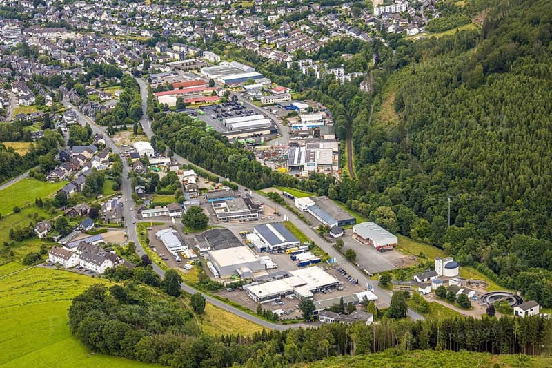 Aerial view, commercial area Unterm Limburg with sewage treatment plant, residential area Bad Berleburg, Wittgensteiner Land, North Rhine-Westphalia, Germany, wastewater treatment, architecture, Bad Berleburg, view from above, roofs, development, Europe, building, municipality, commercial area, green area, sky, houses, industry, infrastructure, sewage treatment plant, landscape, aerial view, nature, order, organisation, region, settlement, town, streets, structure, environment, Unterm Limburg, urban, administration, residential area, residential buildings, German culture, sustainable development