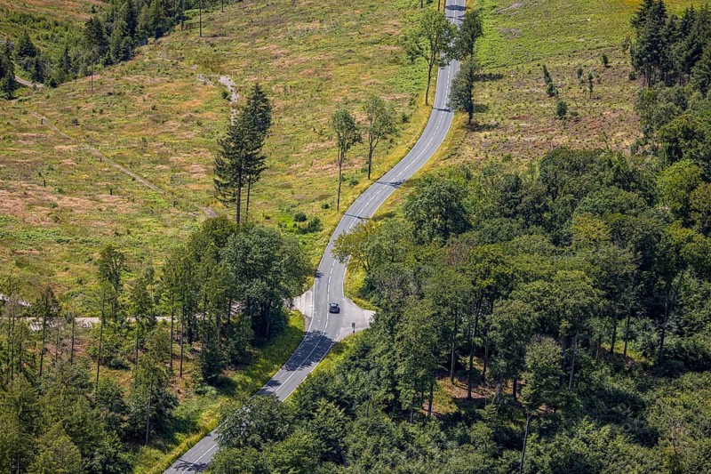 Aerial view, serpentines at the Ochsenkopf between Arnsberg and Sundern in the forest area with forest damage Stockumer Höhe, Sunderner Straße Landesstraße L685, Arnsberg, Sauerland, North Rhine-Westphalia, Germany, DE, Europe, aerial view, aerial photography, aerial photography, Ruhr area, overview, bird's eye view, birds-eyes view, overview