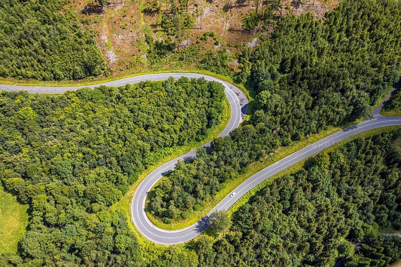 Aerial view, serpentines at the Ochsenkopf between Arnsberg and Sundern in the forest area with forest damage Stockumer Höhe, Sunderner Straße Landesstraße L685, Arnsberg, Sauerland, North Rhine-Westphalia, Germany, DE, Europe, aerial view, aerial photography, aerial photography, Ruhr area, overview, bird's eye view, birds-eyes view, overview