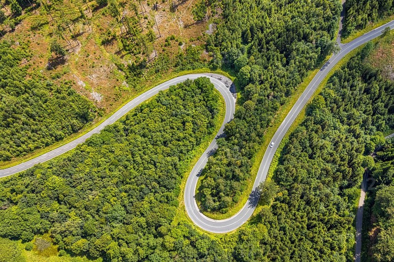 Aerial view, serpentines at the Ochsenkopf between Arnsberg and Sundern in the forest area with forest damage Stockumer Höhe, Sunderner Straße Landesstraße L685, Arnsberg, Sauerland, North Rhine-Westphalia, Germany, DE, Europe, aerial view, aerial photography, aerial photography, Ruhr area, overview, bird's eye view, birds-eyes view, overview