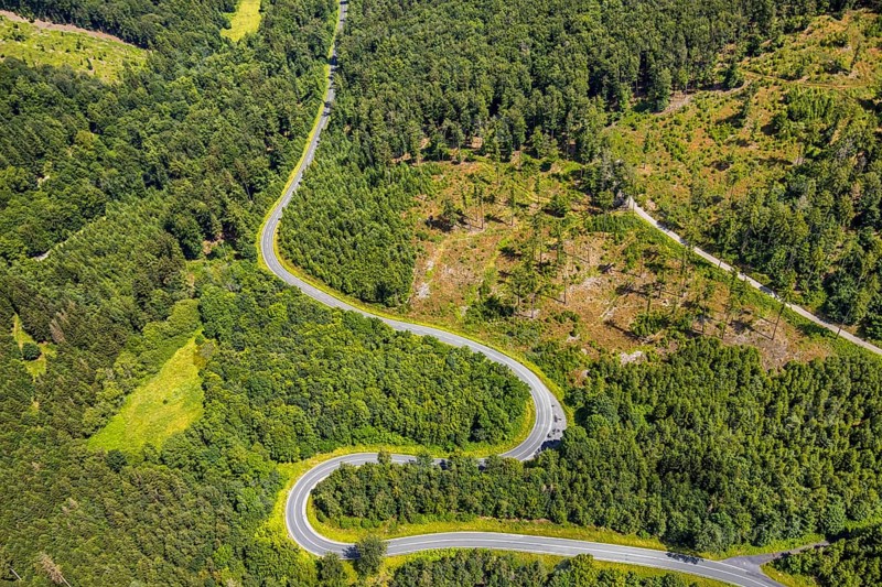 Aerial view, serpentines at the Ochsenkopf between Arnsberg and Sundern in the forest area with forest damage Stockumer Höhe, Sunderner Straße Landesstraße L685, Arnsberg, Sauerland, North Rhine-Westphalia, Germany, DE, Europe, aerial view, aerial photography, aerial photography, Ruhr area, overview, bird's eye view, birds-eyes view, overview