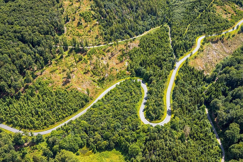 Aerial view, serpentines at the Ochsenkopf between Arnsberg and Sundern in the forest area with forest damage Stockumer Höhe, Sunderner Straße Landesstraße L685, Arnsberg, Sauerland, North Rhine-Westphalia, Germany, DE, Europe, aerial view, aerial photography, aerial photography, Ruhr area, overview, bird's eye view, birds-eyes view, overview
