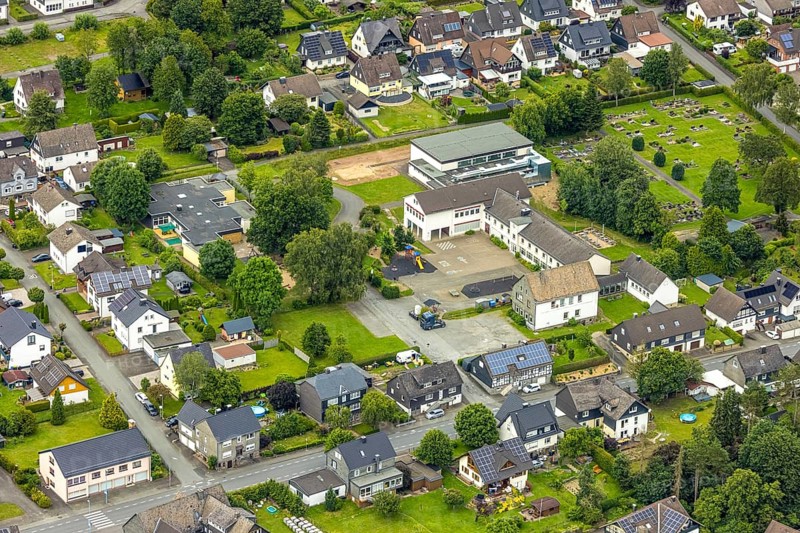 Aerial view, primary school to children's centre and residential area, Berghausen, Bad Berleburg, Wittgensteiner Land, North Rhine-Westphalia, Germany, architecture, education, village, recreation, upbringing, area, building, community, primary school, green area, houses, infrastructure, children, children's centre, teacher, neighbourhood, school, settlement, daylight, environment, bird's eye view, residential area, flats, German, village, scenic, rural, nature