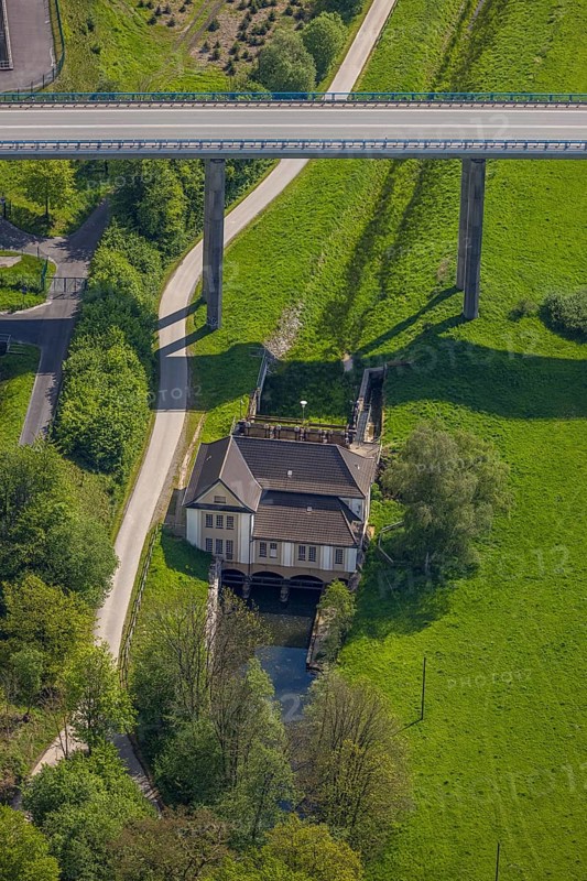 Aerial view, Velmede hydropower plant at the Ruhr Valley Bridge Velmede, Velmede, Bestwig, Sauerland, North Rhine-Westphalia, Germany, hydropower plant, Ruhr Valley Bridge, river, bridge, technology, energy, infrastructure, landscape, nature, building, water, renewable energy, power generation, overpass, traffic, green space, fields, forests, sky, construction plant, industrial area, electricity, sight, engineering, environment, aerial view, architecture, technology, future, sustainability