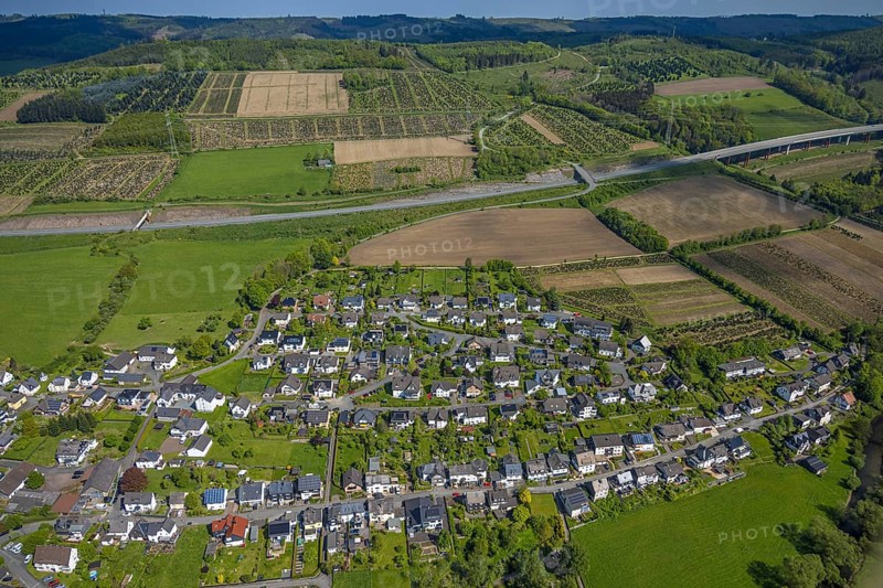 Aerial view, residential area local view district Velmede surrounded by meadows and fields, tree plantations at the motorway A46, agricultural areas, Velmede, Bestwig, Sauerland, North Rhine-Westphalia, Germany, residential area, local view, district, meadows, fields, tree plantations, motorway, A46, rural, infrastructure, roads, nature, settlement, houses, architecture, landscape, village, environment, trees, plants, agriculture, near motorway, region, perspective, open space, vegetation, green areas, residential area, topography, summer, daylight