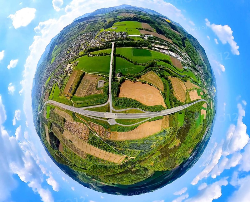 Aerial view, motorway A46 junction Bestwig with view of Velmede, shapes and colours, meadows and fields with tree plantations, globe, fisheye image, fisheye image, 360 degree image, tiny world, little planet, fisheye image, Velmede, Bestwig, Sauerland, North Rhine-Westphalia, Germany, motorway A46, junction Bestwig, shapes, colours, meadows, fields, tree plantations, panorama, infrastructure, landscape, nature, traffic, road network, rural, environment, perspective, view from above, village, scenery, way?, sky, top view