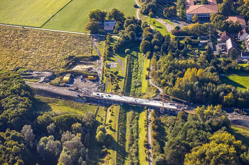 Aerial view, bypass construction site with bridge construction of the state road L821n over the Kuhbach, Oberaden, Bergkamen, Ruhr area, North Rhine-Westphalia, Germany, bypass, construction site, bridge construction, state road L821n, Kuhbach, traffic, infrastructure, construction, road, bridge, river, construction project, landscape, industrial area, crane, machines, construction site vehicles, engineering, development, aerial view, urban planning, architecture, modernisation, progress, transport routes, construction work, technology, environment