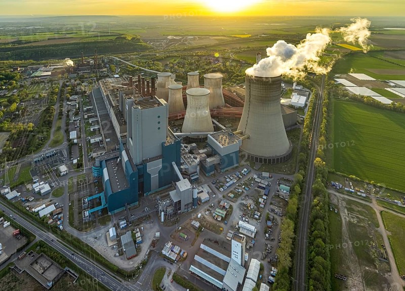 Aerial view, Niederaussem lignite-fired power plant, power plant site of RWE Power AG, cooling towers and smoke clouds, distant view, Bergheim, Rhineland, North Rhine-Westphalia, Germany, lignite-fired power plant, Niederaussem, RWE Power AG, cooling towers, smoke clouds, industry, energy production, pollution, air pollution, energy, power generation, infrastructure, technology, landscape, view from above, architecture, power plant site, environment, emissions, CO2, power plant, industrial, energy industry, sustainability, clouds, sky, outdoors