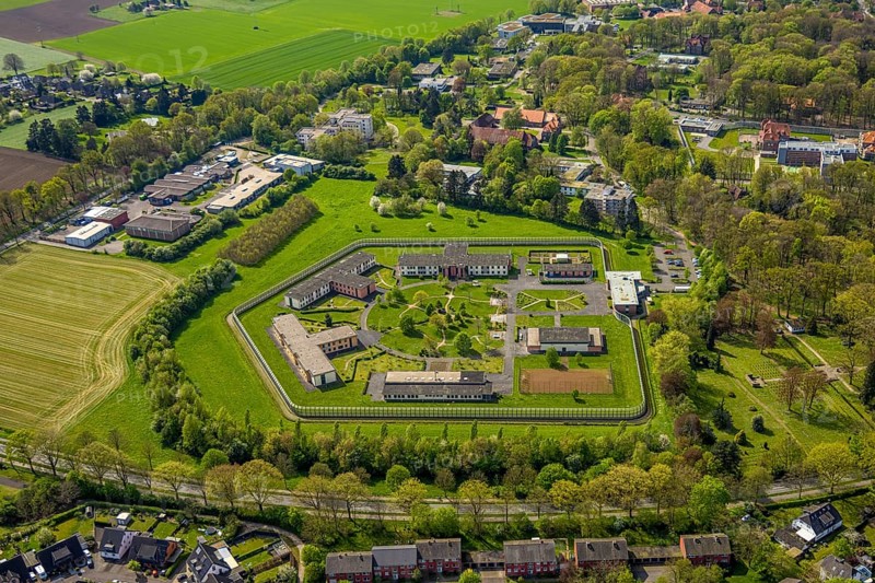 Aerial view, Forensic Psychiatry - LVR Clinic, special psychiatric facilities, circular garden, residential area local view Bedburg-Hau, Hau, Bedburg-Hau, Lower Rhine, North Rhine-Westphalia, Germany, architecture, treatment, trees, top view, facility, forensic psychiatry, garden, building, community, health care, health care system, green areas, LVR clinic, landscape, aerial view, medicine, local view, care, planning, psychiatry, security, special clinic, town, town view, structure, urban, supply, residential area, circular, public building