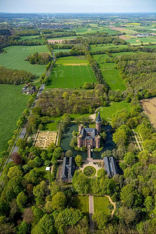 Aerial view, Museum Schloss Moyland, neo-Gothic moated castle and castle park surrounded by meadows and fields and forest, excursion destination on the Lower Rhine, Moyland, Bedburg-Hau, Lower Rhine, North Rhine-Westphalia, Germany, architecture, excursion destination, castle, trees, recreation, fields, leisure, buildings, history, green spaces, idyll, culture, landscape, nature, panorama, park, castle park, sight, daylight, tourism, forest, water, meadows, outdoors, gothic, historic, rural, neo-gothic moated castle