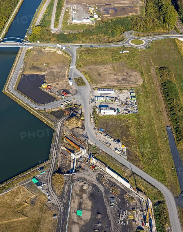 Aerial view, Water City Aden on the Datteln-Hamm Canal, construction area for planned urban quarter on the site of the former Haus Aden colliery, close-up on Jahnstraße, Oberaden, Bergkamen, Ruhr area, North Rhine-Westphalia, Germany, Aden, architecture, construction area, construction project, Datteln-Hamm Canal, river, site, Haus Aden, industrial history, industrial heritage, infrastructure, Jahnstraße, canal, landscape, modernisation, perspective, planning, settlement development, urban development, structure, technology, water town, former colliery, planned urban quarter, historic site, above, urban change, urban area, urban