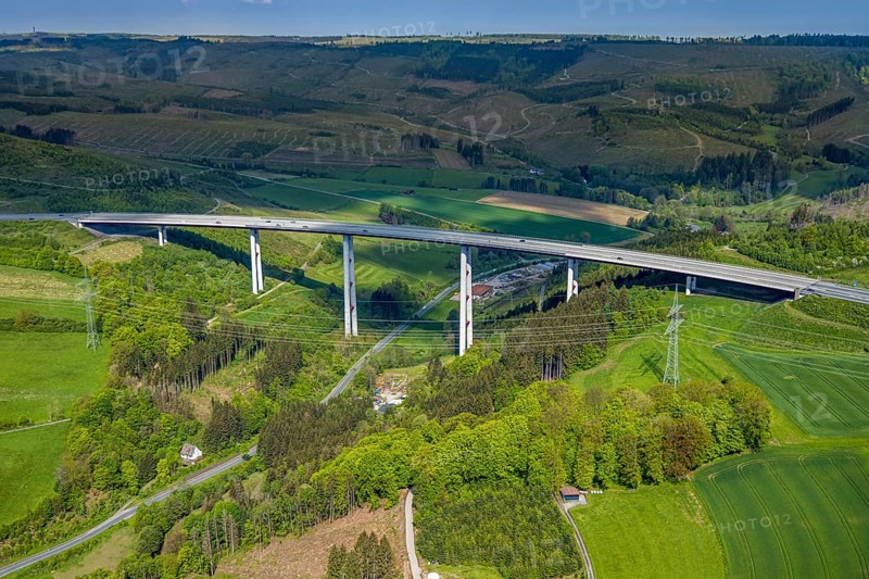 Aerial photograph, motorway A 46 viaduct Nuttlar, forest area with forest damage, Nuttlar, Bestwig, Sauerland, North Rhine-Westphalia, Germany, motorway A46, viaduct Nuttlar, forest area, forest damage, bridge, motorway, traffic, infrastructure, environment, forest, nature, destruction, aerial photograph, landscape, road network, wood, trees, means of transport, transport, civilisation, aerial perspective, pollutant, aerial photography, road, vehicles